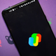 A photo of an Android device with Google Pay logo